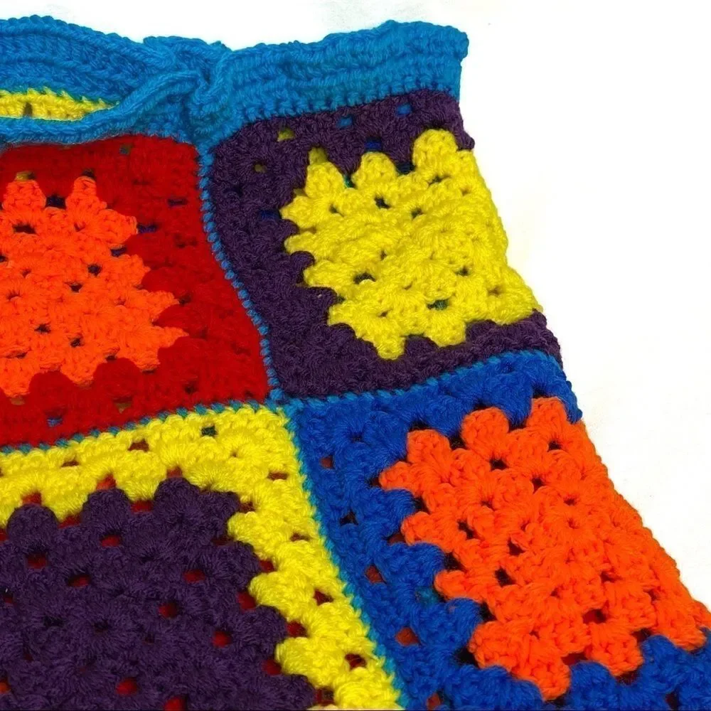 Hand crocheted bright multi colored Afghan size 56” X 31”